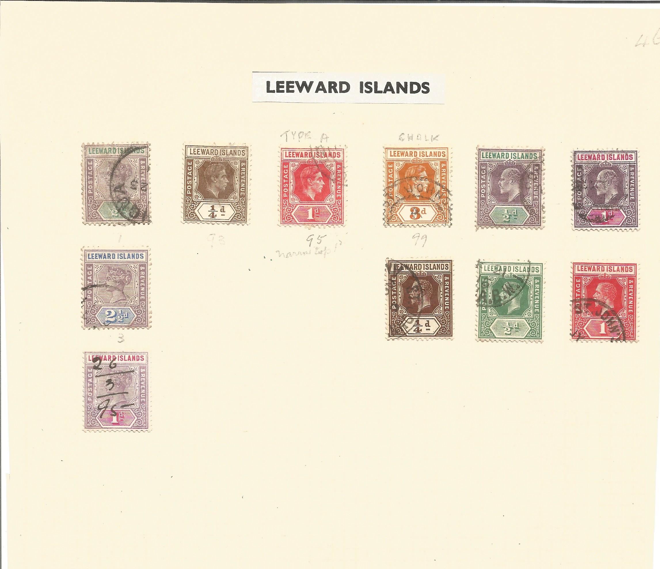 Leeward Island stamps on loose album page. 11 stamps. Good condition. We combine postage on multiple