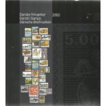 Danish 2002 stamp yearbook. Unmounted mint stamps. Good condition. We combine postage on multiple