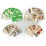 John Player and sons cigarette card collection on 5 album pages. Mainly cricket, football, tennis.