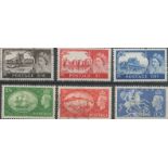GB stamp collection on stock card. Includes QEII 2/6d used, 5/= mint, 10/2 mint, GVI 2/6d mint,