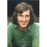Joe Corrigan Signed 8x12 Manchester City Photo. Good condition. All autographs come with a
