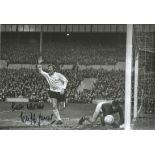 Cliff Jones Signed 8x12 Tottenham Hotspur Photo. Good condition. All autographs come with a