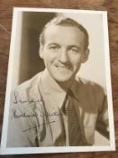 David Niven signed 7 x 5 inch sepia portrait photo. Good condition. All autographs come with a