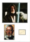 Alec Guinness 18x13 mounted signature piece includes two coloured photos pictured in his role as