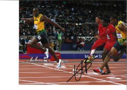 Usain Bolt collection 2 signed 16x12 colour photo. Usain St Leo Bolt, OJ, CD ( born 21 August