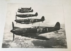 WW2 Robert Stanford Tuck signed superb 16 x 12 inch b/w photo of Four Spitfires in flight dated 3