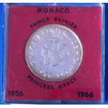 Monaco, Prince Rainier and Princess Grace 1956-1966 10 year marriage coin. Coin showing signs of