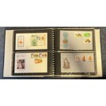 Queen Elizabeth Silver Jubilee Album with over 100 Silver Jubilee FDC with Stamps and Various FDI