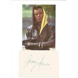 Grace Jones signed signature card, attached to A4 card sheet, also attached is a 7x5 colour photo of
