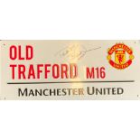 Teddy Sheringham signed Manchester United Old Trafford M16 commemorative metal road sign. Good
