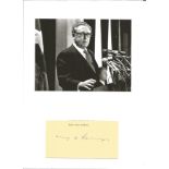 Henry Kissinger signed signature piece attached to A4 card, with a 7x5 black and white photo also