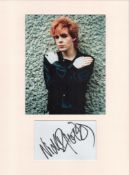 Nick Rhodes (Duran Duran) signature piece in autograph presentation. Mounted with photograph to