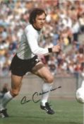 Franz Beckenbauer signed 12x8 colour photo. Grainy image. Good condition. All autographs come with a