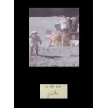 Apollo 15 James Irwin. Signature mounted with picture of James Irwin on the moon. Professionally