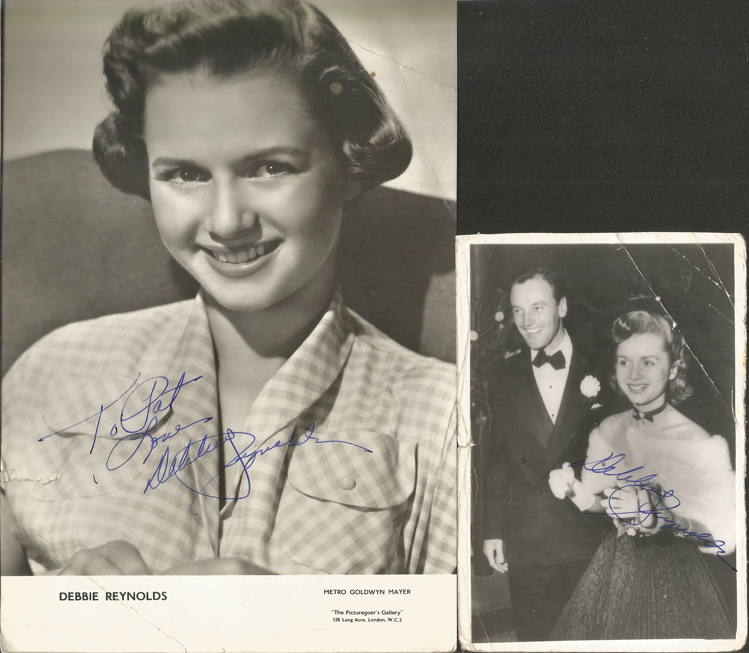 Debbie Reynolds signed black and white photo collection. 2 included. Good condition. All