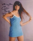 007 Bond girl Caroline Munro signed sexy pose 8x10 photo. Good condition. All autographs come with a
