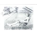 Peggy Cummins signed 7x5 black and white photo. Good condition. All autographs come with a