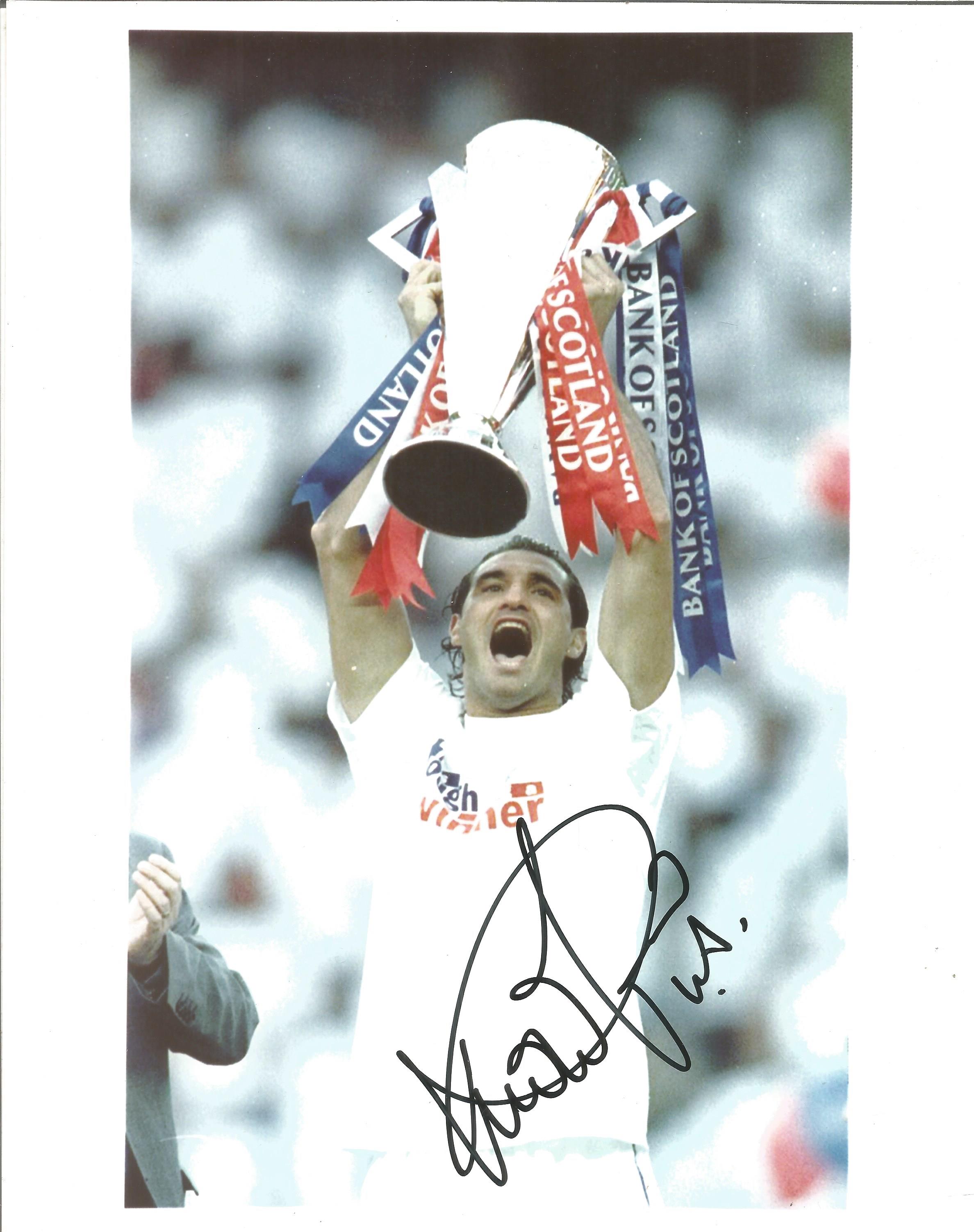 Lorenzo Amoruso Signed Glasgow Rangers Cup 8x10 Photo. Good condition. All autographs come with a