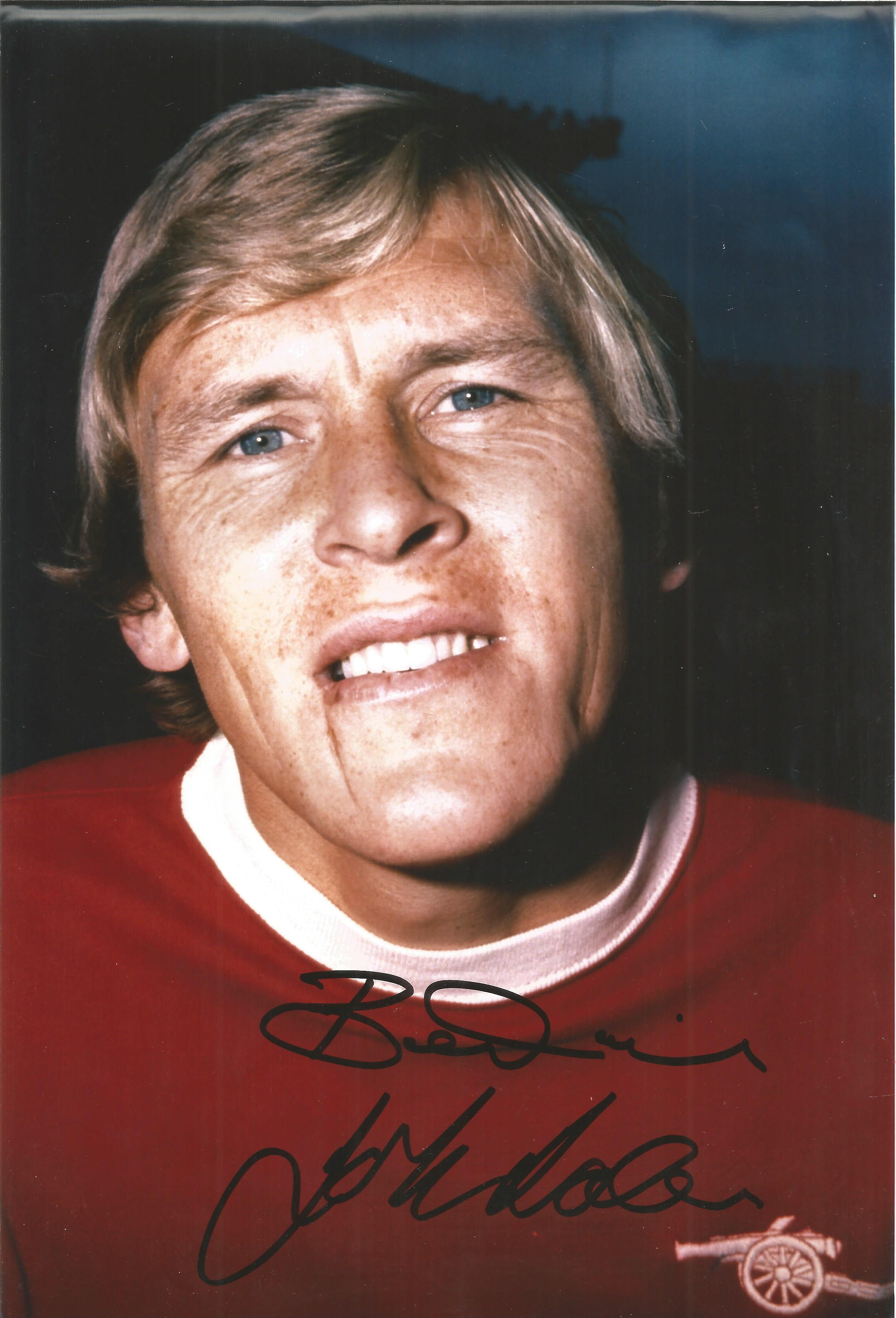 John Roberts Signed 8x12 Arsenal Photo. Good condition. All autographs come with a Certificate of
