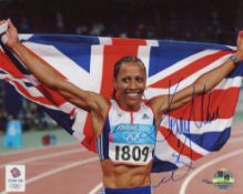 Kelly Holmes. 8x10 photo from the Athens Olympics signed by Gold medal winning athlete Dame Kelly