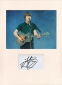 Jake Bugg signature piece in autograph presentation. Mounted with photograph to approx. 16 x 12