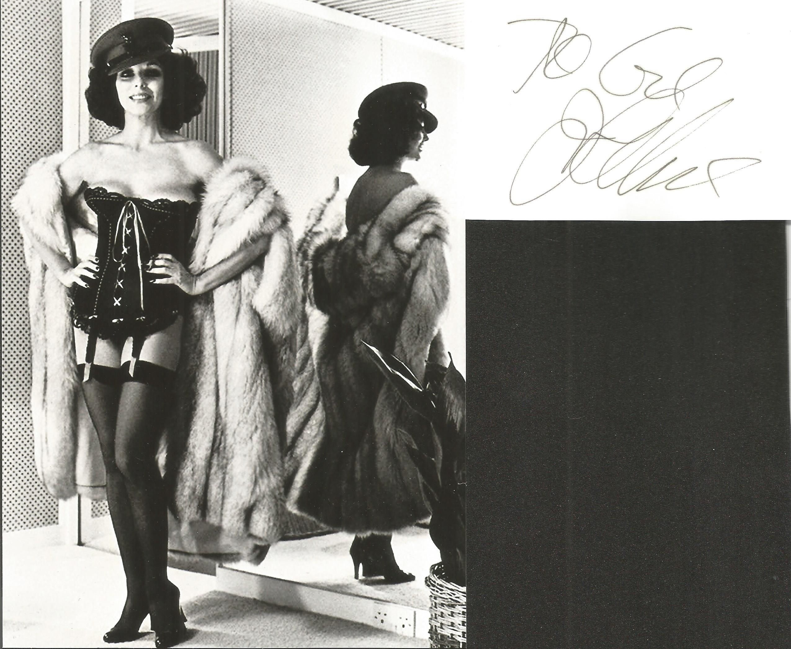 Joan Collins Actress Signed Card With Photo. Good condition. All autographs come with a