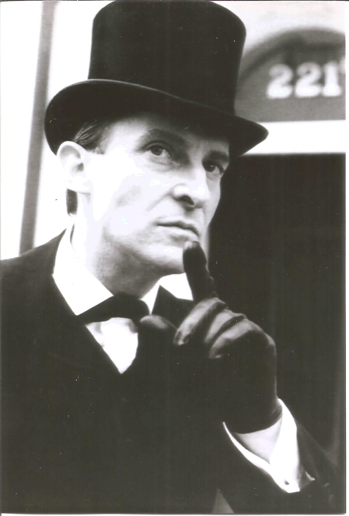 Jeremy Brett Sherlock Holmes UNSIGNED 6" by 4" photo with signature attached to back. Good