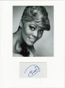 Dionne Warwick signed card piece. Mounted with photograph to approx. 16 x 12 inches. Good condition.