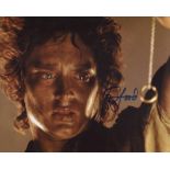 Lord of the Rings 8x10 photo signed by actor Elijah Wood who played Frodo Baggins in the movies.