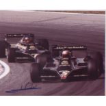 Mario Andretti signed 10 x 8 inch photo during F1 race. Good condition. All autographs come with a