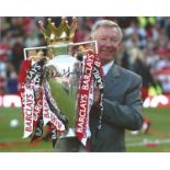 Alex Ferguson signed 10x8 colour photo holding the Premier league trophy. Good condition. All