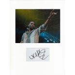 Wretch 32 signature piece in autograph presentation. Mounted with photograph to approx. 16 x 12