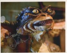 Gremlins movie photo signed by actor Mark Dodson. Good condition. All autographs come with a