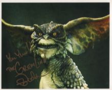 Gremlins movie photo signed by actor Mark Dodson. Good condition. All autographs come with a