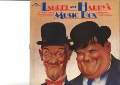 Laurel and Hardy memorabilia collection. UNSIGED. Includes record, programmes, photos. Good