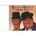 Laurel and Hardy memorabilia collection. UNSIGED. Includes record, programmes, photos. Good