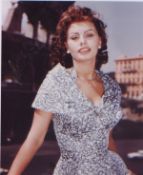 Sophia Loren signed 10 x 8 inch photo . Faint signature. Good condition. All autographs come with