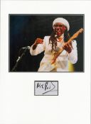 Nile Rodgers signature piece in autograph presentation. Mounted with photograph to approx. 16 x 12