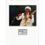 Nile Rodgers signature piece in autograph presentation. Mounted with photograph to approx. 16 x 12