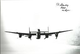 WW2 Bomber pilot Dick Starkey 106 Sqn signed 12 x 8 inch b/w photo of a Lancaster in flight. Good