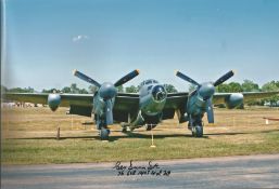 WW2 Bomber pilot George Dunn DFC signed 12 x 8 inch colour photo of a Mosquito on ground. Good