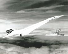 Concorde pilot Capt Viv Gunton signed 10 x 8 inch b/w photo of Concorde in flight above the