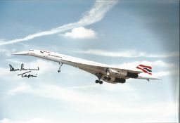 Concorde pilot Captain Dave Rowland signed 12 x 8 inch colour photo of Concorde in flight with