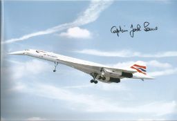 Concorde pilot Captain Jock Lowe signed 12 x 8 inch colour photo of Concorde in flight with nose
