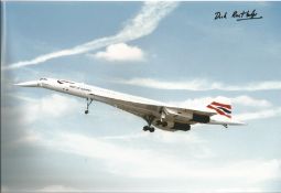 Concorde pilot Captain Dick Routledge signed 12 x 8 inch colour photo of Concorde in flight with