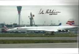 Concorde pilot Captain Ian Hutchinson signed 12 x 8 inch colour photo of Concorde on tarmac parked..
