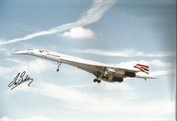 Concorde pilot Captain Les Brodie signed 12 x 8 inch colour photo of Concorde in flight with nose