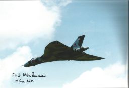 RAF Vulcan bomber pilot Flt Lt Mike Pearson 12 Sqn signed 12 x 8 inch colour photo of a Vulcan in