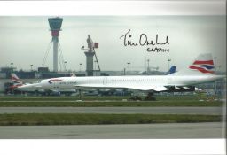 Concorde pilot Captain Tim Orchard signed 12 x 8 inch colour photo of Concorde on tarmac parked..
