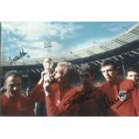Geoff Hurst and Martin Peters signed 12 x 8 inch colour 1966 World Cup final football photo. Good